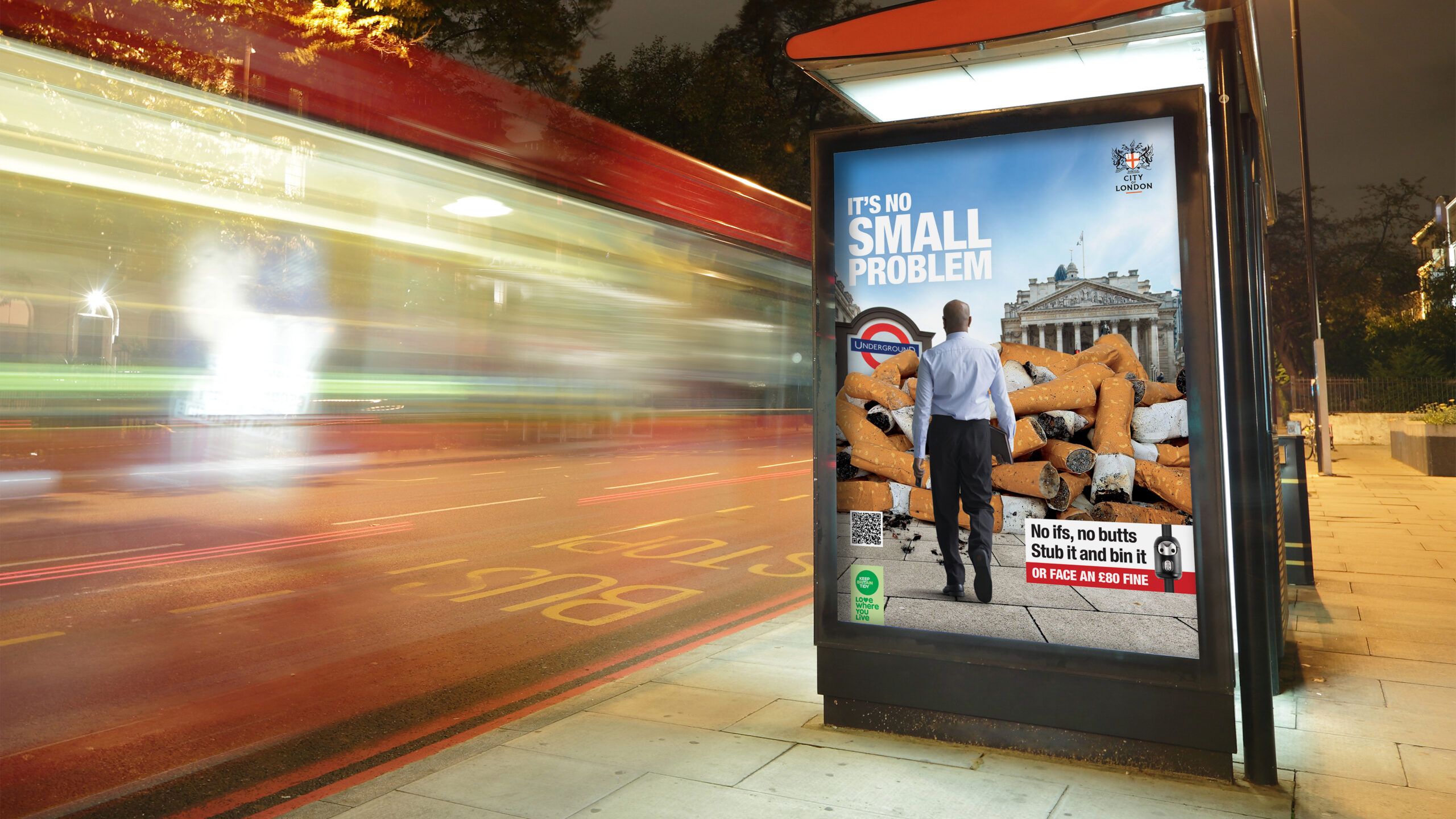 Image of bus shelter poster with the "No ifs, no butts, Stub it and bin it", campaign
