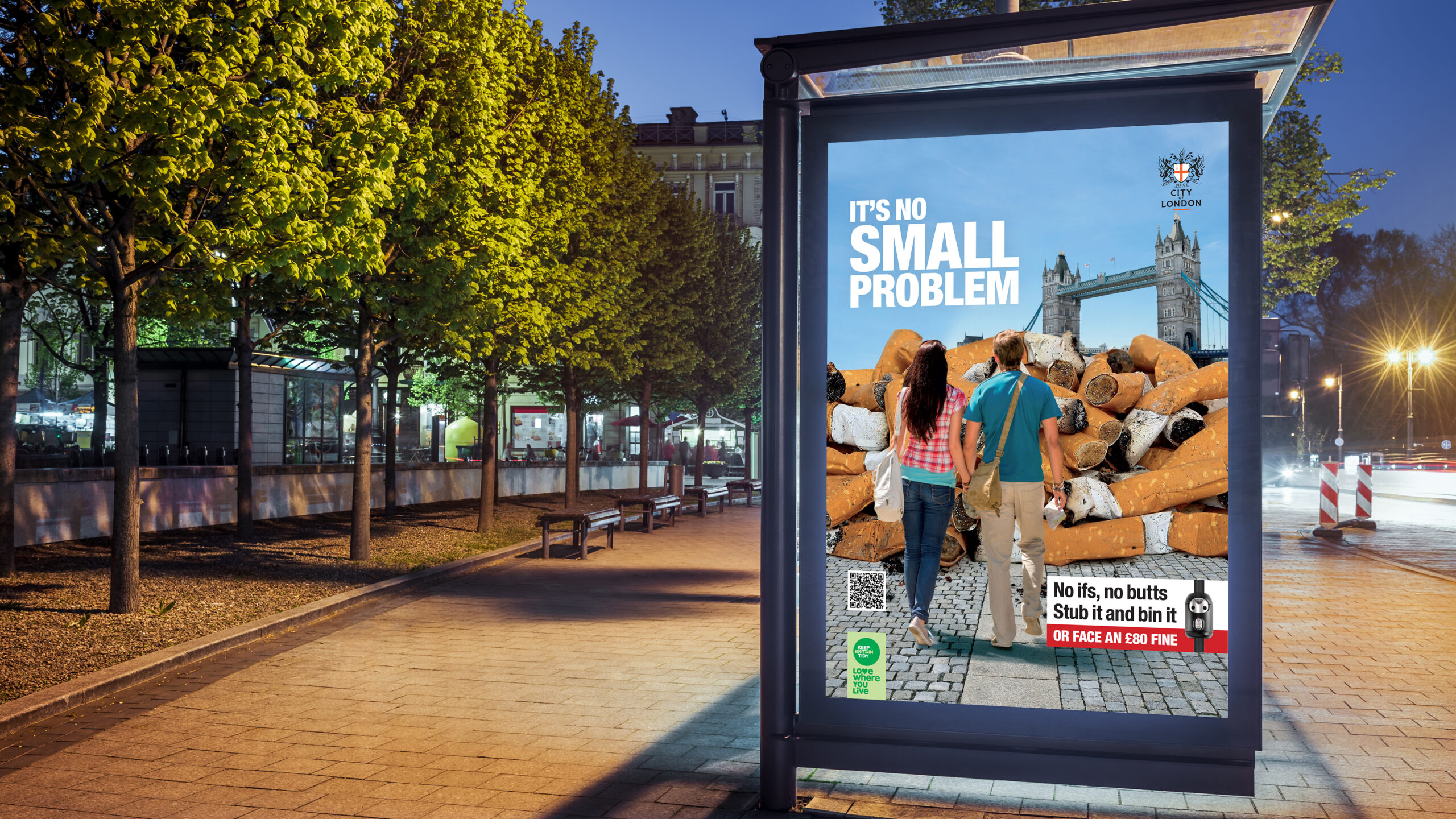 Image of bus shelter poster with the "No ifs, no butts, Stub it and bin it", campaign